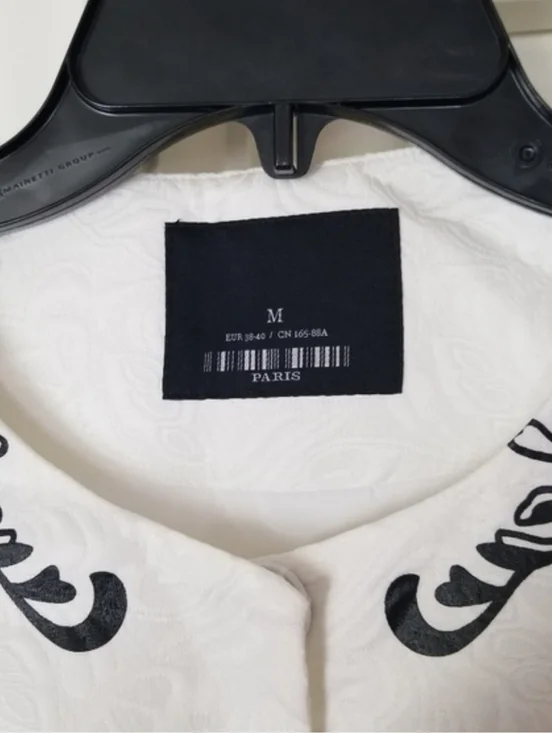 White Embroidered Jacquard Appliqué Cameo Overcoat with Black Motifs - Picture 2 of 4